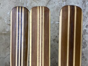 Three Laminated paddles with light and dark woods. 5 layers in the loom.